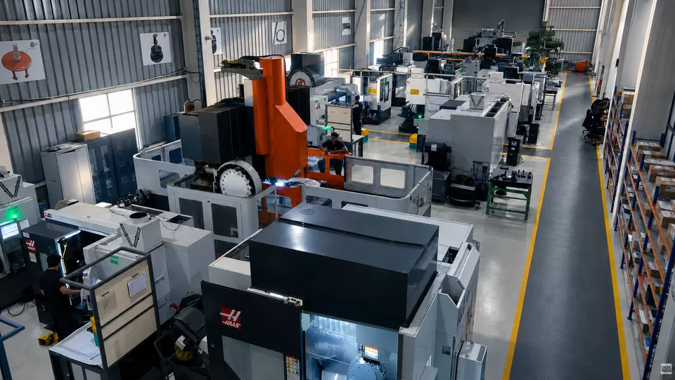 Wide view of production machines across a factory floor